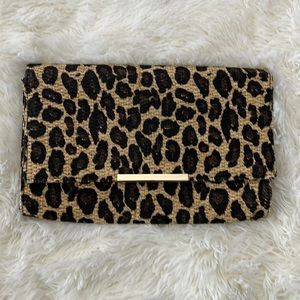 H&M leopard print straw clutch bag